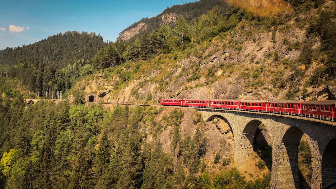 Photo by S.Ratanak red train on focus photography